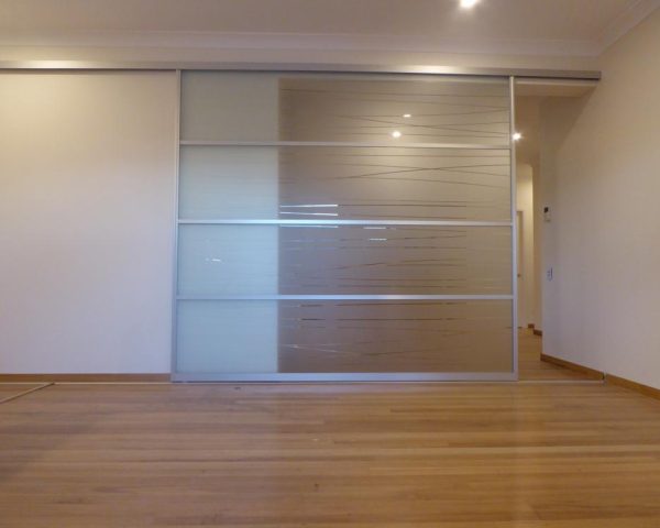 Internal Glass Sliding room divider Frosted with Design In Glass Design