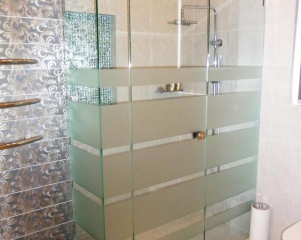 Frameless Corner Showerscreen with Hinged door and Sandblasted privacy panels