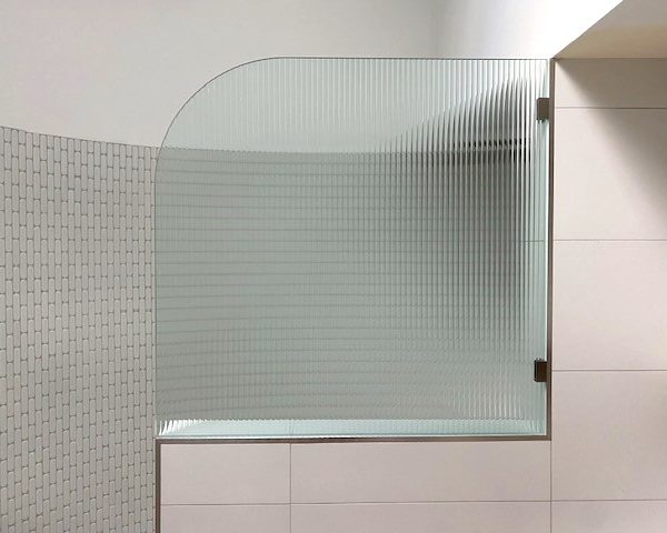 Frameless Single Fixed Panel Reeded Glass Showerscreen With Radius Cut